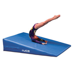 UCS incline gymnastics mat, a blue vinyl-covered foam wedge sloping from its high end down to a 2 inch base
