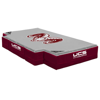 A High Jump landing area with a gray top surface featuring a large maroon UC Santa Barbara logo, and maroon side panels with white UCS branding, shown on a plain white background.